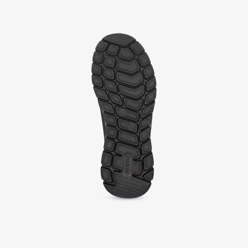 Schwarze Schuhsohle mit tiefem Profil für optimale Rutschfestigkeit und langlebige Strapazierfähigkeit