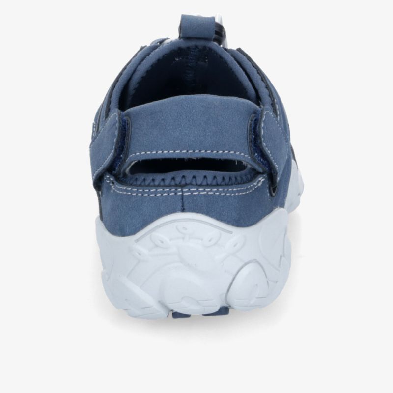 Blauer Schuh mit weißer rutschfester Sohle und verstellbarem Klettverschluss für optimalen Halt