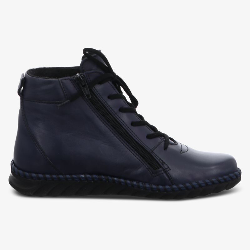 Seitliche Ansicht eines navyblauen Lederboots mit seitlichem Reißverschluss und robuster Sohle