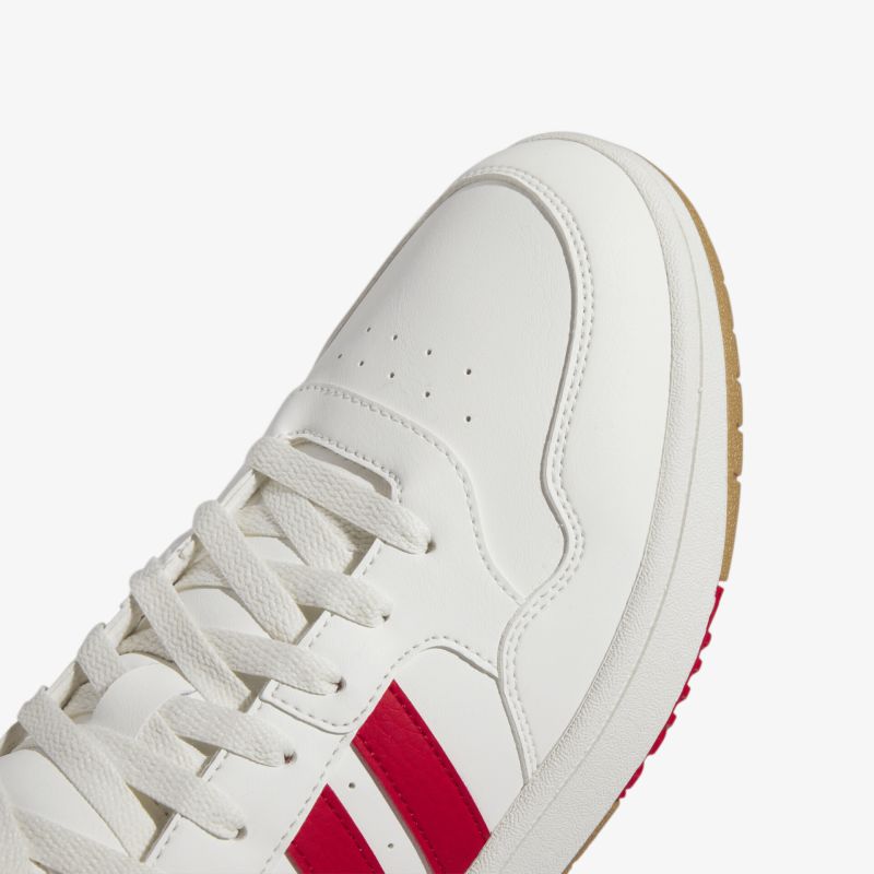 Weißer Freizeitschuh mit roten Details, stilvolles Design, ideale Passform, strapazierfähige Materialien, sportlicher Look.