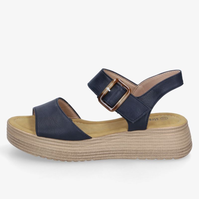 Seitliche Ansicht einer navy blauen Plattform Sandalette mit breiten Riemen, verstellbarer Schnalle und bequemer Sohle