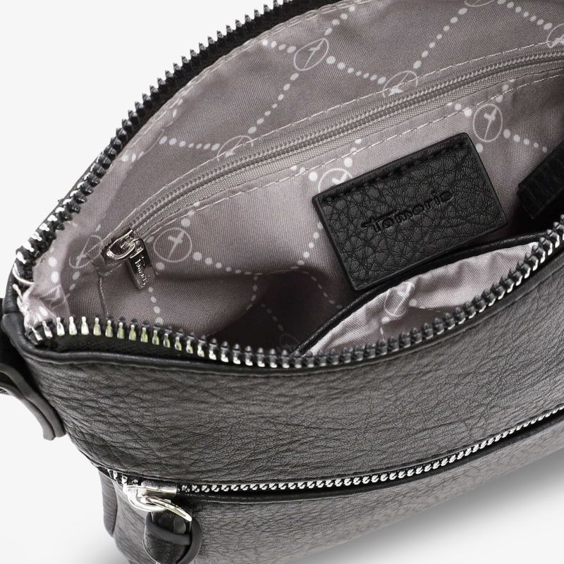 Elegante Tasche mit Reißverschluss, geräumigem Innenfach und stilvollem Futter in hochwertiger Lederoptik.