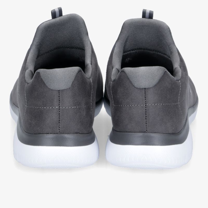 Eleganter grauer Sneaker mit weißer Sohle für stilvollen Komfort.