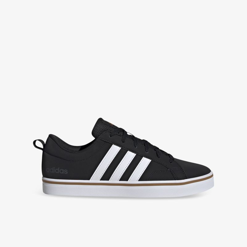 Schwarzer Sneaker mit weißen Streifen, leichter und bequemer Sportschuh im seitlichen Profil
