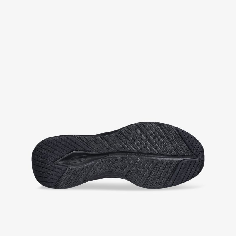 Schwarze Schuhsohle mit tiefem Profil für optimalen Halt und langlebige Nutzung