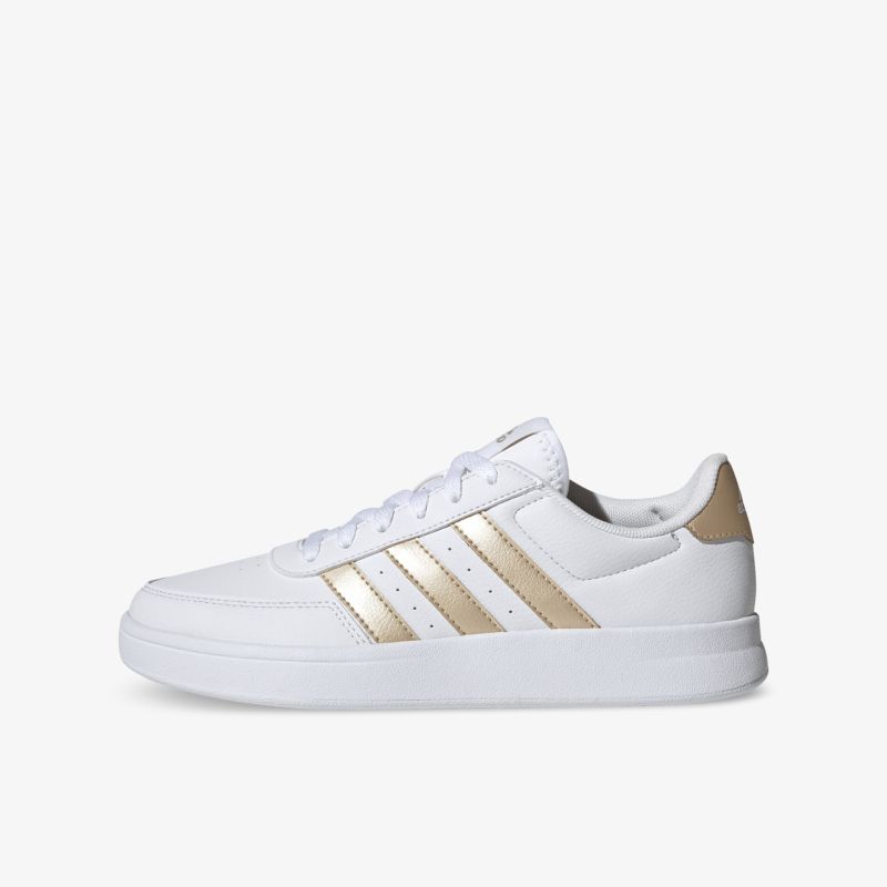 Moderner weißer Sneaker mit goldenen Akzenten, ideal für vielseitige Styles und bequemen Tageskomfort.