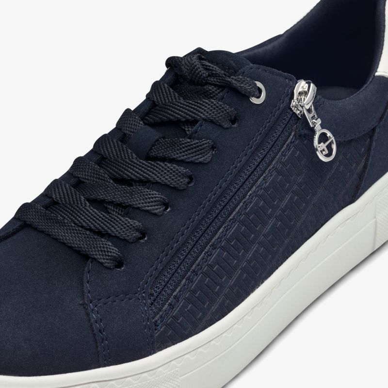 Modischer Sneaker mit Reißverschluss und rutschfester Sohle. Komfortabel und langlebig gestaltet.