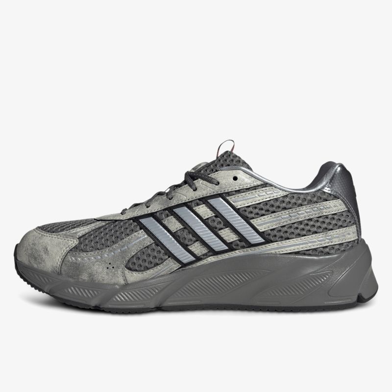 Moderner grauer Sneaker mit seitlichem Streifendesign und bequemer Polsterung für hohen Tragekomfort