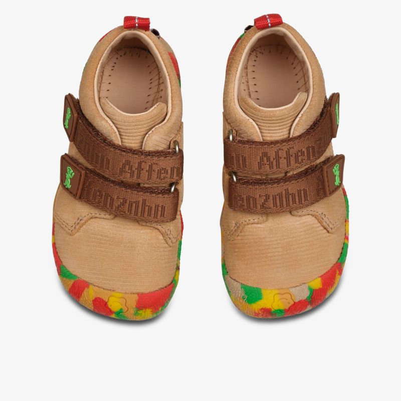 Bequeme Schuhe mit bunten Sohlen und praktischem Klettverschluss für sicheren Halt und flexiblen Tragekomfort