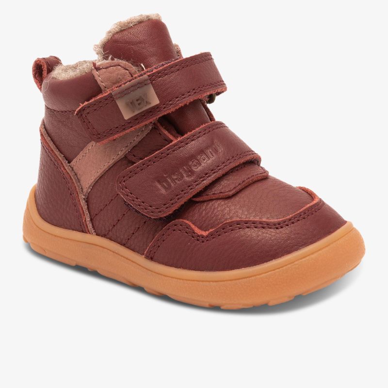 Robuster Kinderschuh mit warmem Innenfutter und rutschfester Sohle für optimalen Halt und Komfort