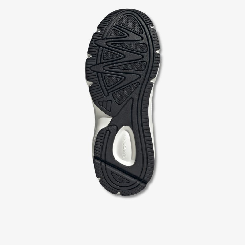 Robuste Schuhsohle mit rutschfestem Profil und flexiblem Torsionselement für optimalen Halt und Komfort