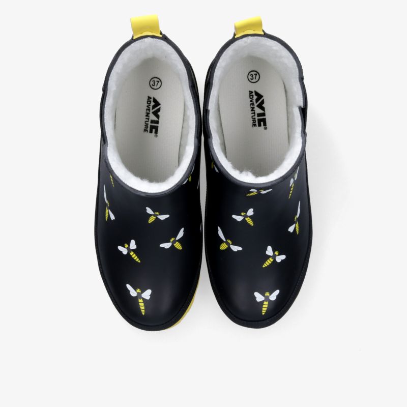 Stylische Gummischuhe mit Bienenmotiv, wasserdicht und bequem, ideal für alle Wetterlagen.