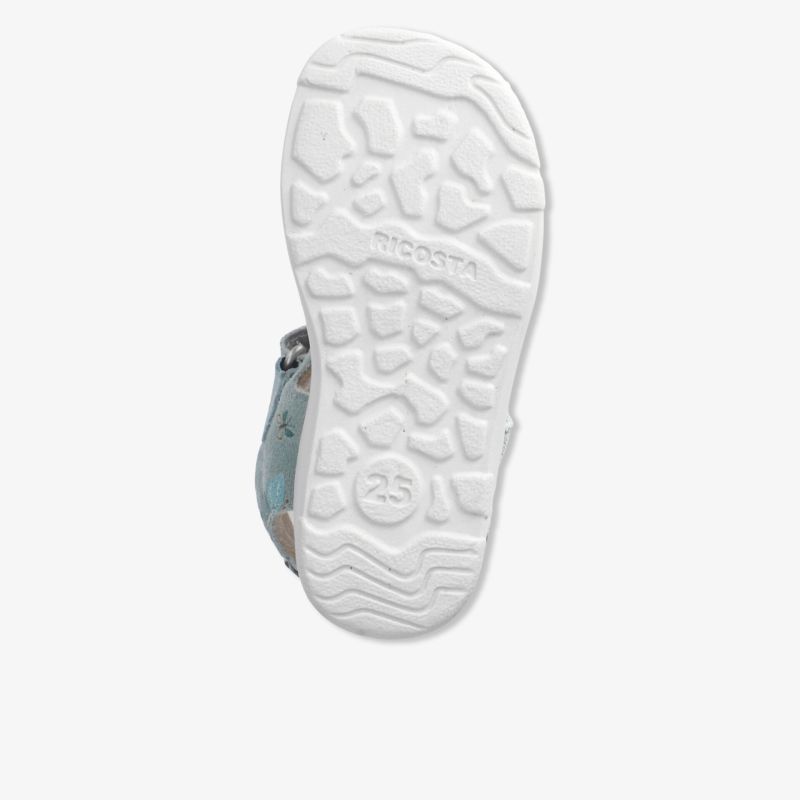 Weiße Schuhsohle mit rutschfestem Profil für optimale Trittsicherheit und hohen Tragekomfort