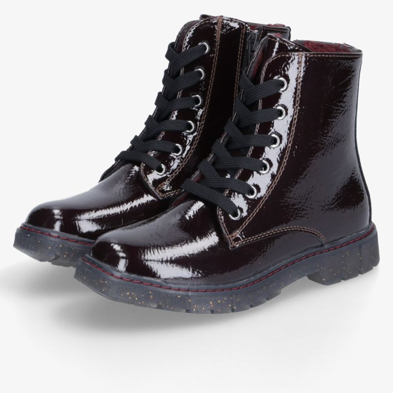 Paar glänzende schwarze Schnürboots aus Lackleder mit seitlichem Reißverschluss und profilierter, robuster Laufsohle