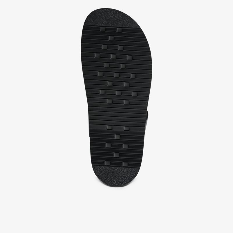 Robuste und profilierte schwarze Laufsohle für sicheren Halt und lange Lebensdauer