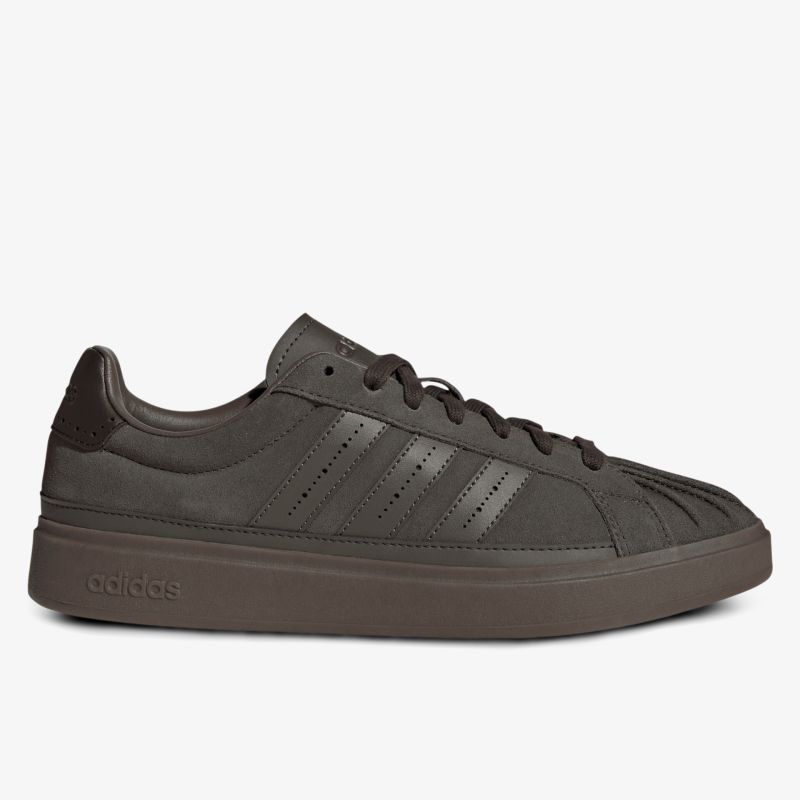 seitlich aufgenommener dunkelgrauer Sneaker aus Leder mit Gummi-Sohle und Schnürung