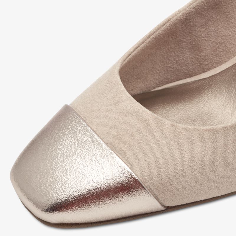 Bequemer Schuh mit elegant metallischer Spitze und hochwertigem Obermaterial nahe aufgenommen