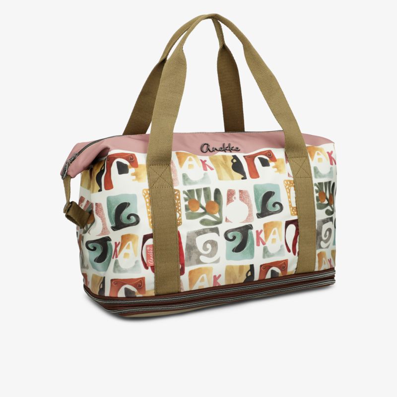 Stylische Tasche mit buntem Muster und robusten Tragegriffen, geräumig und vielseitig für Alltag und Reisen