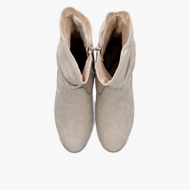 Beige Stiefeletten aus weichem Material als Paar in der Draufsicht, mit elegantem Look und komfortabler Passform.