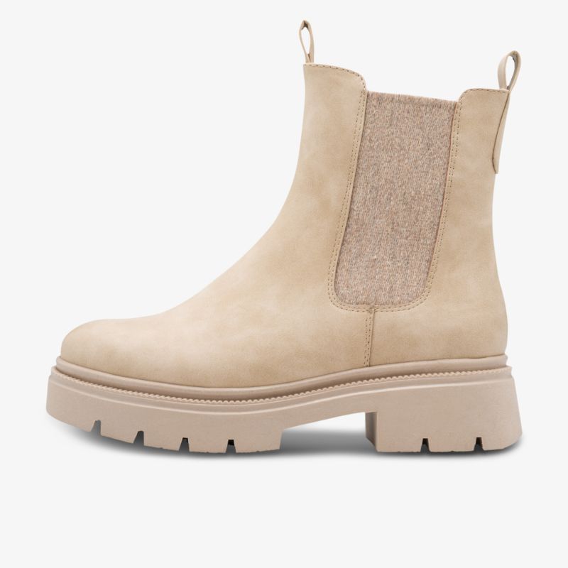 Beiger Stiefel mit elastischen Seitenteilen und robuster Profilsohle für hohen Tragekomfort