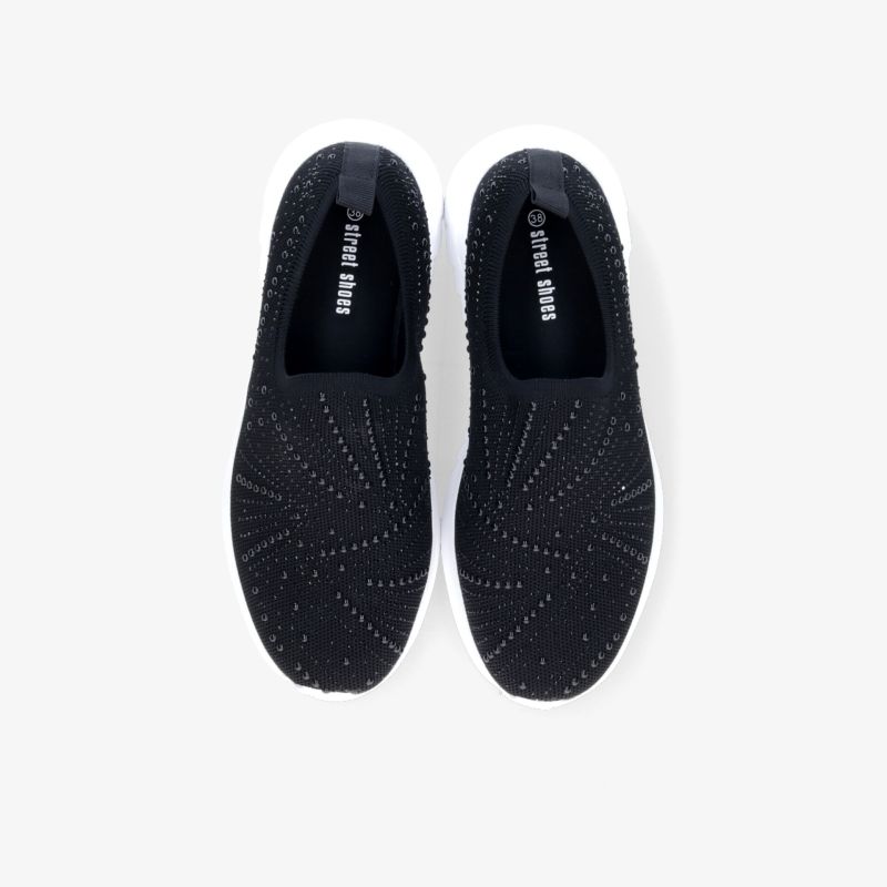 Schwarze Schuhe im Paar, leichte und flexible Passform mit modischem Design und rutschfester Sohle