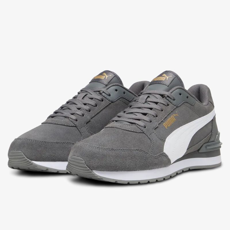 Sportlicher grauer Puma Sneaker mit bequemen Tragekomfort und modernem Design in Frontansicht