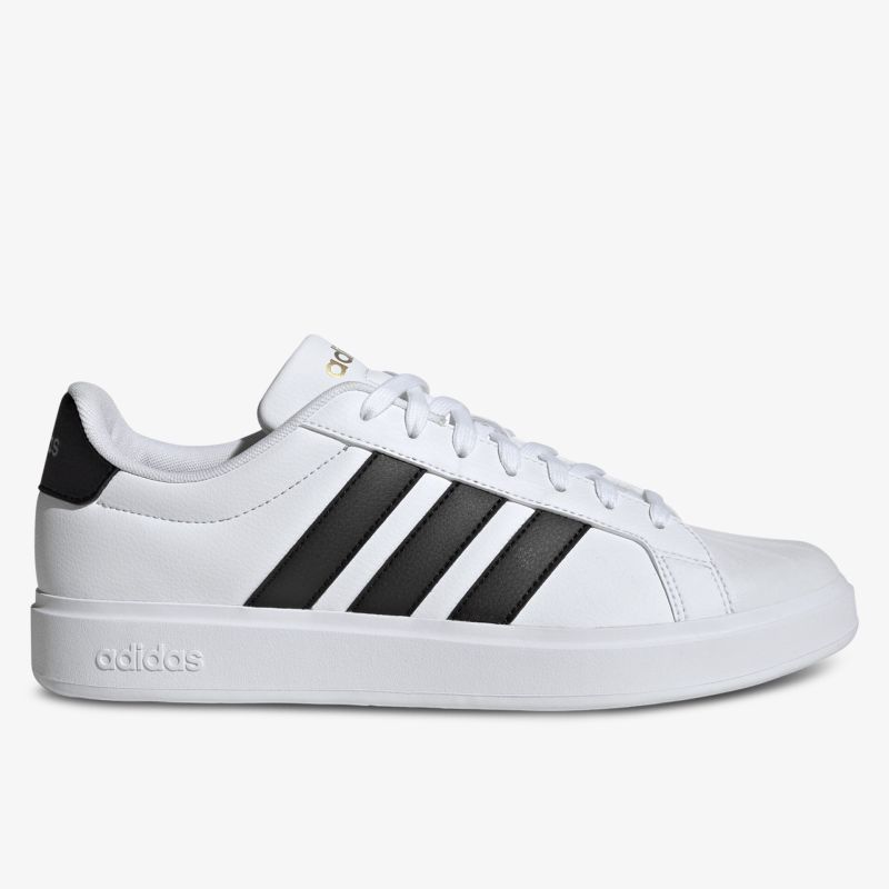 Moderner weißer Sneaker mit schwarzem Streifendesign und robuster Sohle für sportlichen Komfort