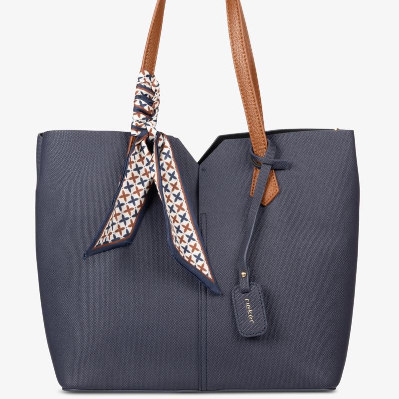 Geräumiger blauer Shopper mit braunen Henkeln und dekorativem Tuch für vielseitige Nutzung