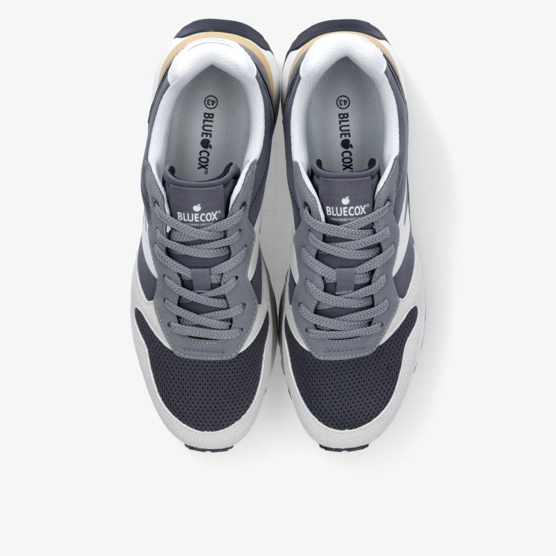 Sportliche graue Sneaker mit atmungsaktivem Material und bequemer Passform, ideal für vielseitigen Einsatz