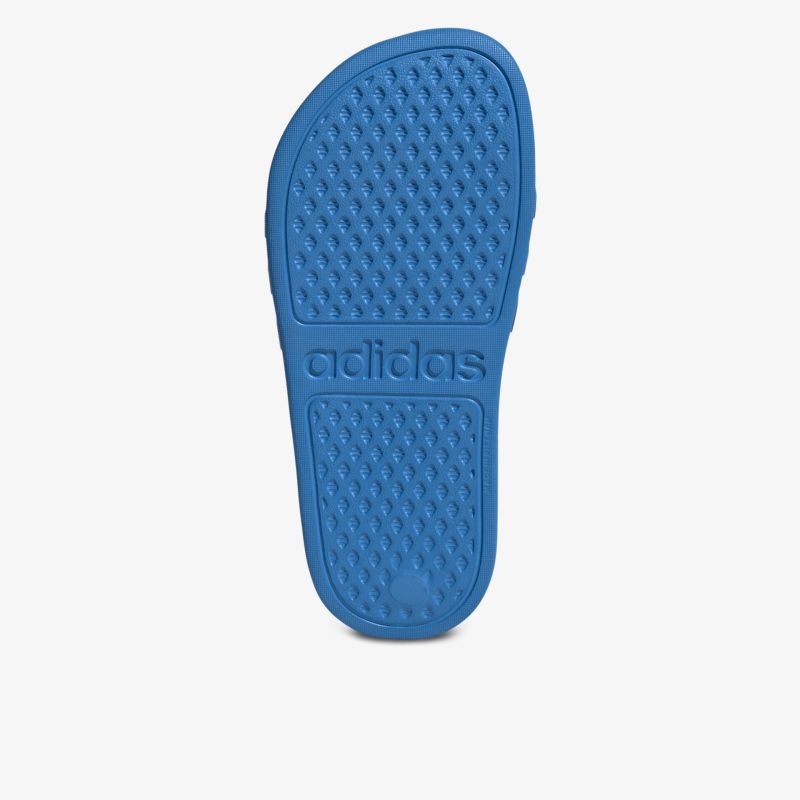 Rutschfeste blaue Schuhsohle mit profilierter Oberfläche für sicheren Halt und Komfort