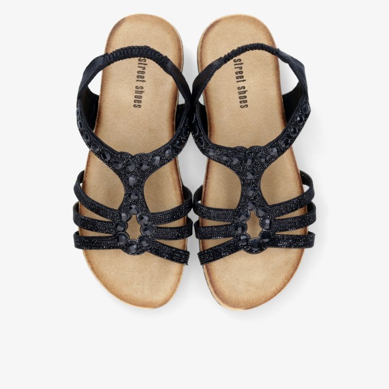 Schwarze Sandalen mit verstellbaren Riemen und komfortabler Fußbettung, perfekter Begleiter für warme Tage