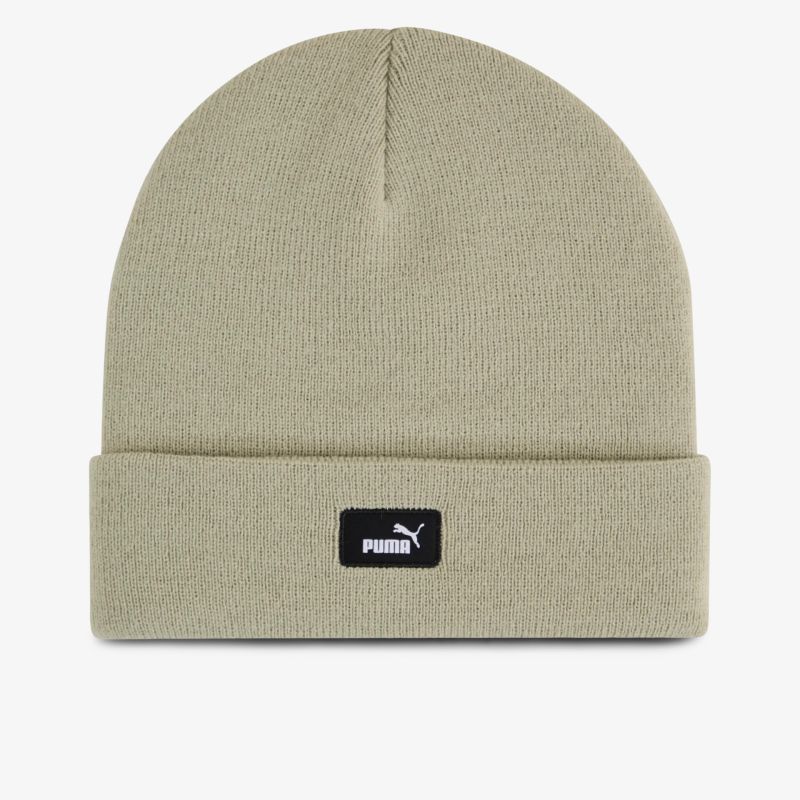 Beige gestrickte Beanie mit PUMA Logo, warm und komfortabel für kalte Tage
