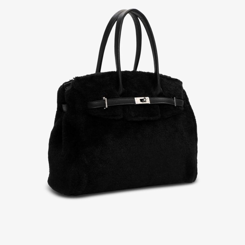 Elegante schwarze Tasche mit weichem Material und praktischem Verschluss für stilvolles Tragen