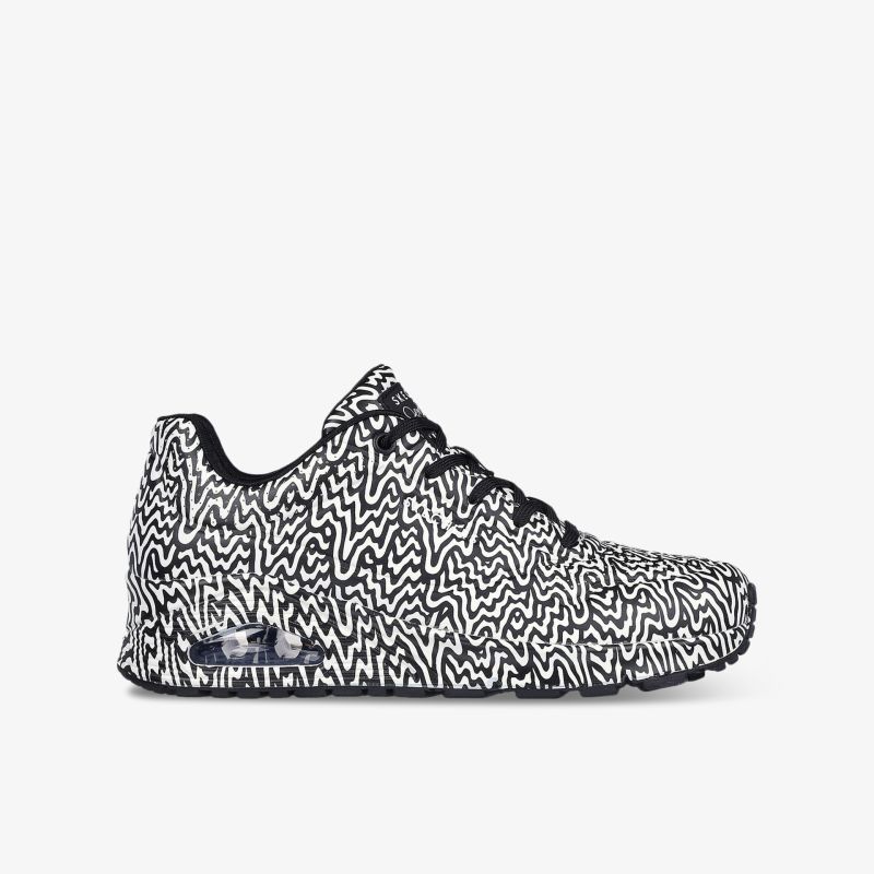 Leichter Sneaker mit modernem Schwarz-Weiß-Muster, flexibler und bequemer Schuh für Alltag und Sport