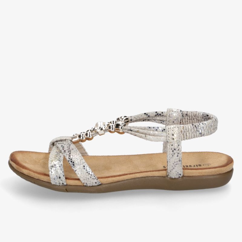 Silberne glitzernde Sandale mit verstellbarem Riemen und bequemer Sohle, seitliche Ansicht, leicht und elegant