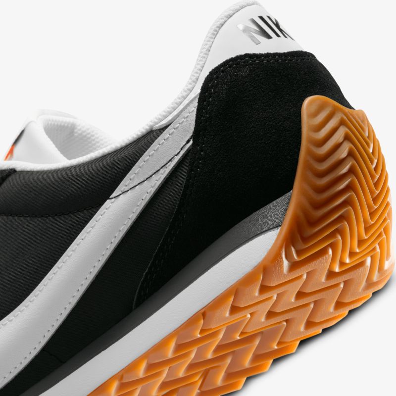 Sporty shoe with durable design and textured slip-resistant sole. Perfect for active wear.