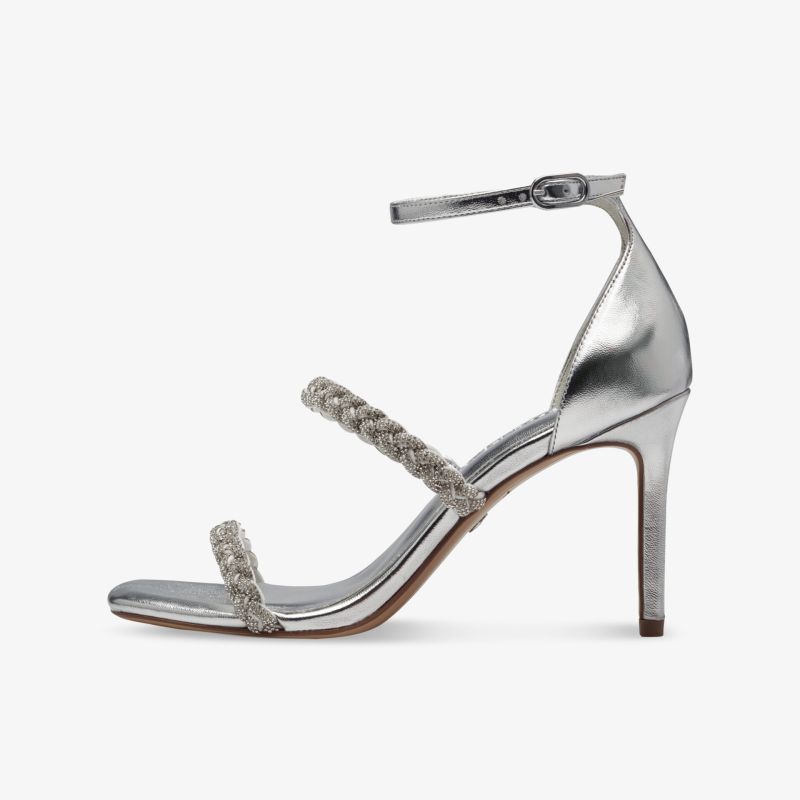 Moderner silberner Absatzschuh mit zwei Riemen und hohem schlankem Absatz für festliche Anlässe