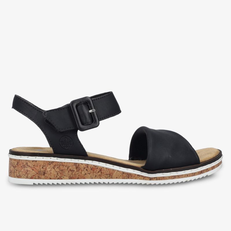 Schwarze Sandale mit verstellbarem Klettverschluss und Kork-Optik auf weißer Profilsohle seitliche Ansicht