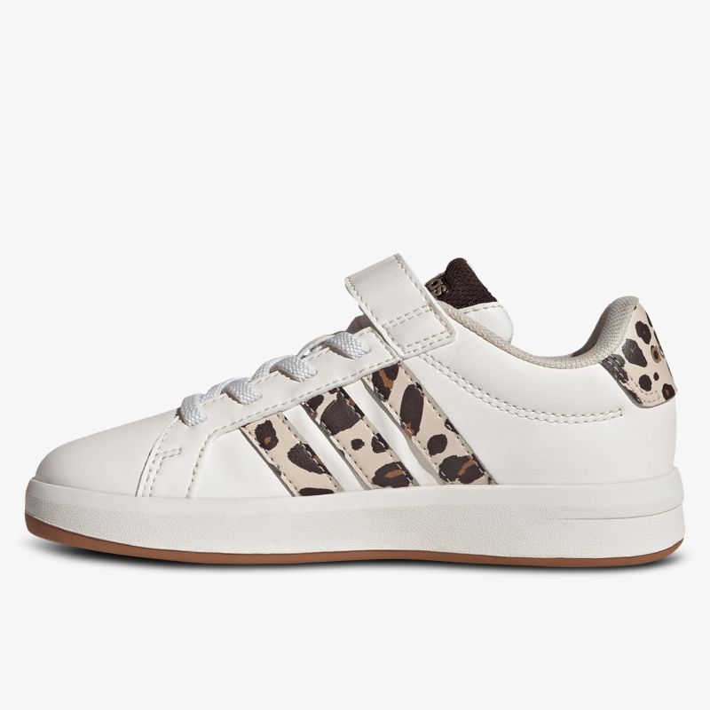 Weißer Sneaker seitliche Ansicht mit Leopardenmuster und praktischem Klettverschluss für komfortablen Halt