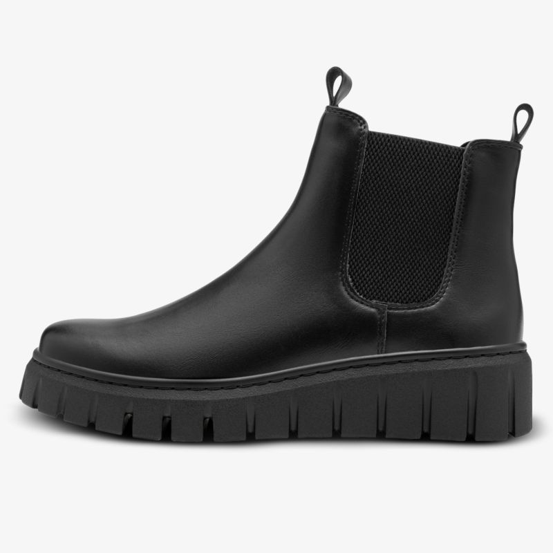 Schwarzer Chelsea Boot mit elastischen Seiteneinsätzen und profilierter Gummisohle für modernen Stil und hohen Tragekomfort