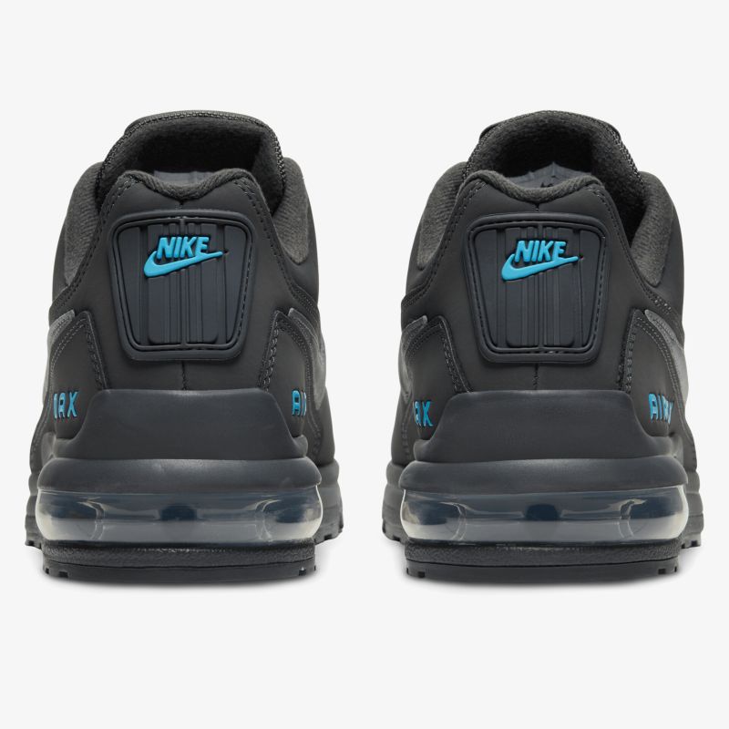Schwarze Nike Air Max Sneaker mit blauen Akzenten und transparenter Sohle von hinten