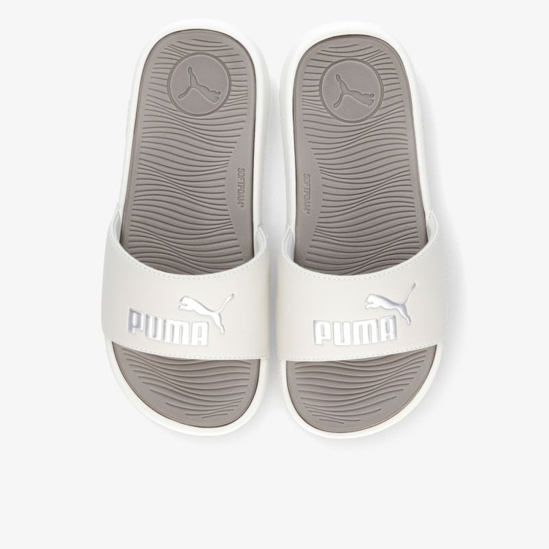 Bequeme hellgraue Puma Badeschuhe mit gepolsterter Sohle und rutschfestem Profil, ideal für Freizeit und Sport.