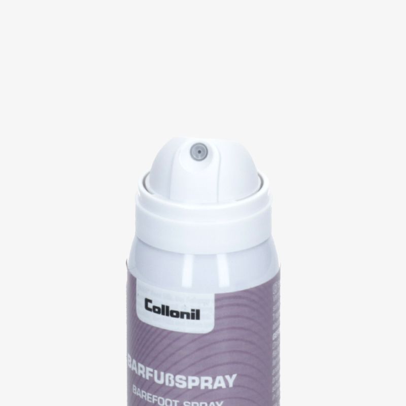 Detailaufnahme eines weißen Schuhpflegesprays mit präziser Sprühöffnung und hochwertigem Design