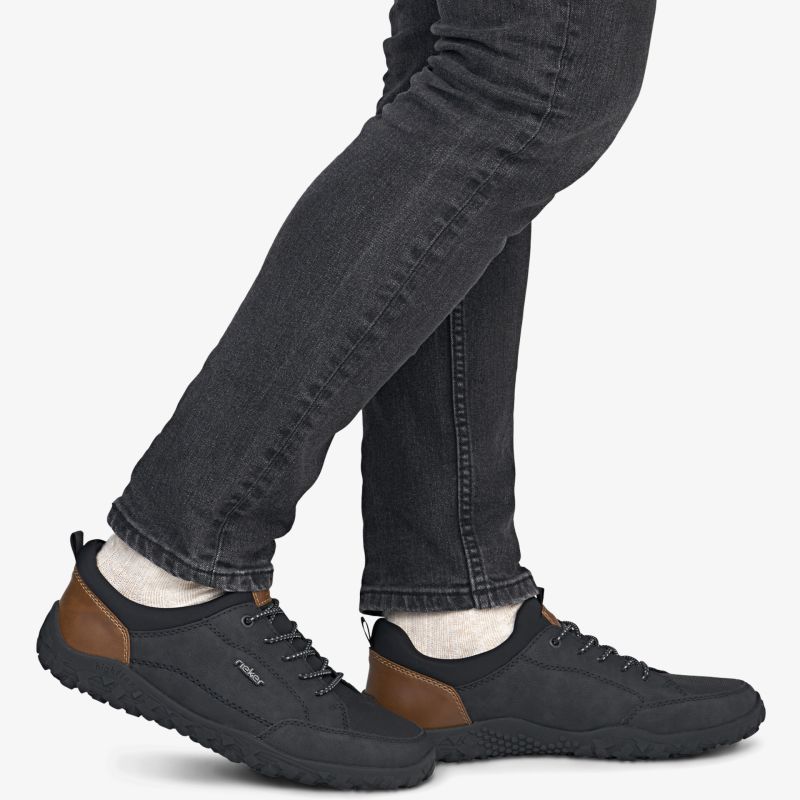 Bequeme und modische schwarze freizeitschuhe mit kontrastfarbener ferse, ideal für den alltag