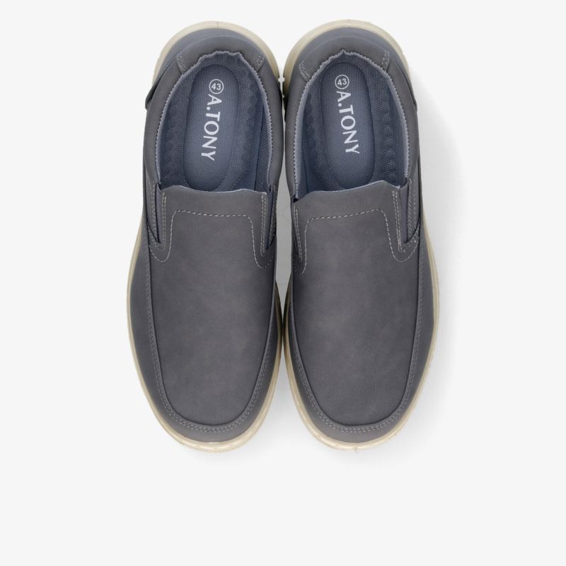 Graue Slip-on-Schuhe als Paar in liegender Draufsicht mit weichem Obermaterial, gepolsterter Innensohle und flexiblem Rand