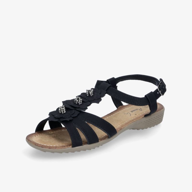 Bequeme Sandale mit flacher Sohle, verstellbarem Riemen und dekorativen Details ideal für sommerlichen Komfort