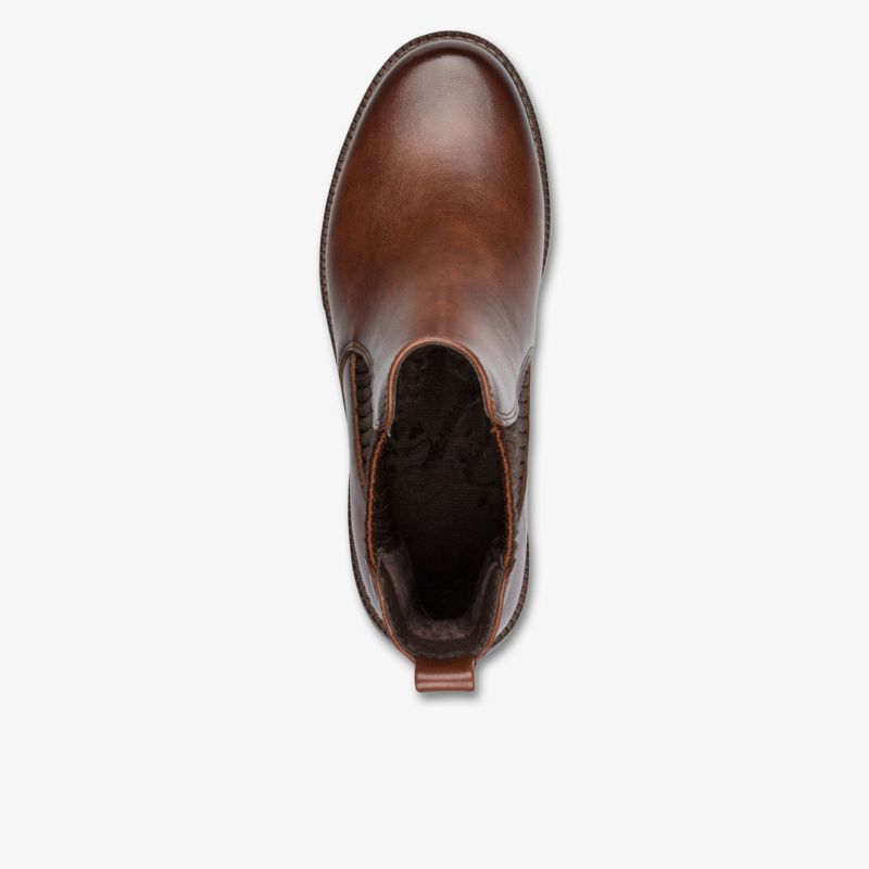 Eleganter brauner Lederstiefel mit hochwertiger Verarbeitung und robustem Design in Draufsicht