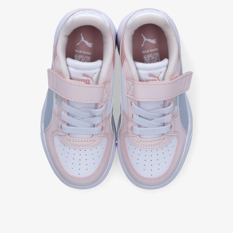 Trendige weiße und rosa Sneaker mit bequemem Klettverschluss und atmungsaktiver Oberfläche. Perfekt für alle Aktivitäten.