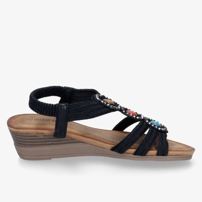 Bequeme Sandalette mit niedrigem Keilabsatz und dekorativen Steinen, seitliche Ansicht für eleganten Look