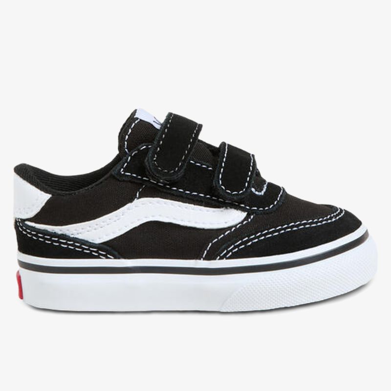 Schwarzer Kinder Sneaker mit weißen Details und Klettverschluss, flexible weiße Sohle, bequeme und strapazierfähige Ausführung